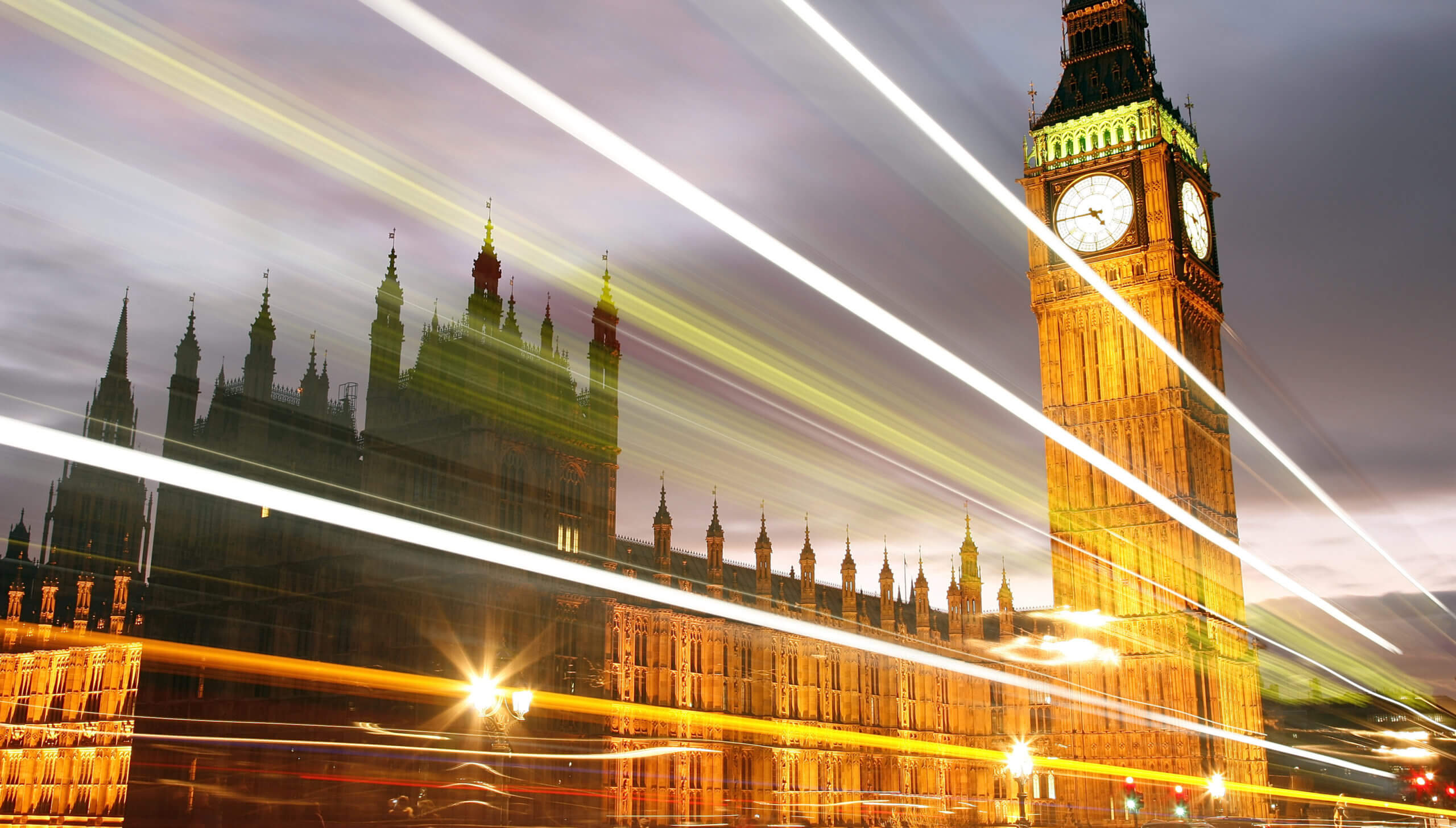 The UK Houses of Parliament and Big Ben, at dusk with lens flare