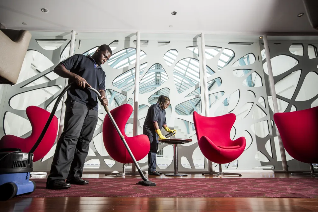Two Mitie collegues perform cleaning in the Odeon Cinema