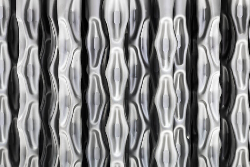 Extreme close-up of metallic heat exchanger rod