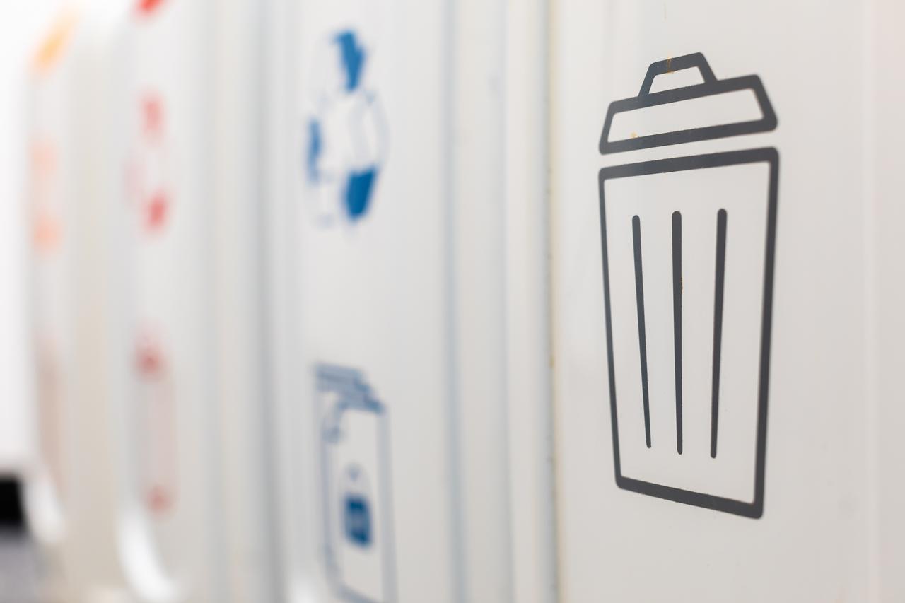 Close up of the symbols on rubbish/waste bins