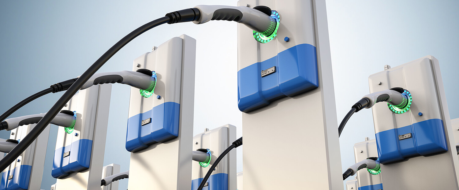 A row of white and blue EV charging ports