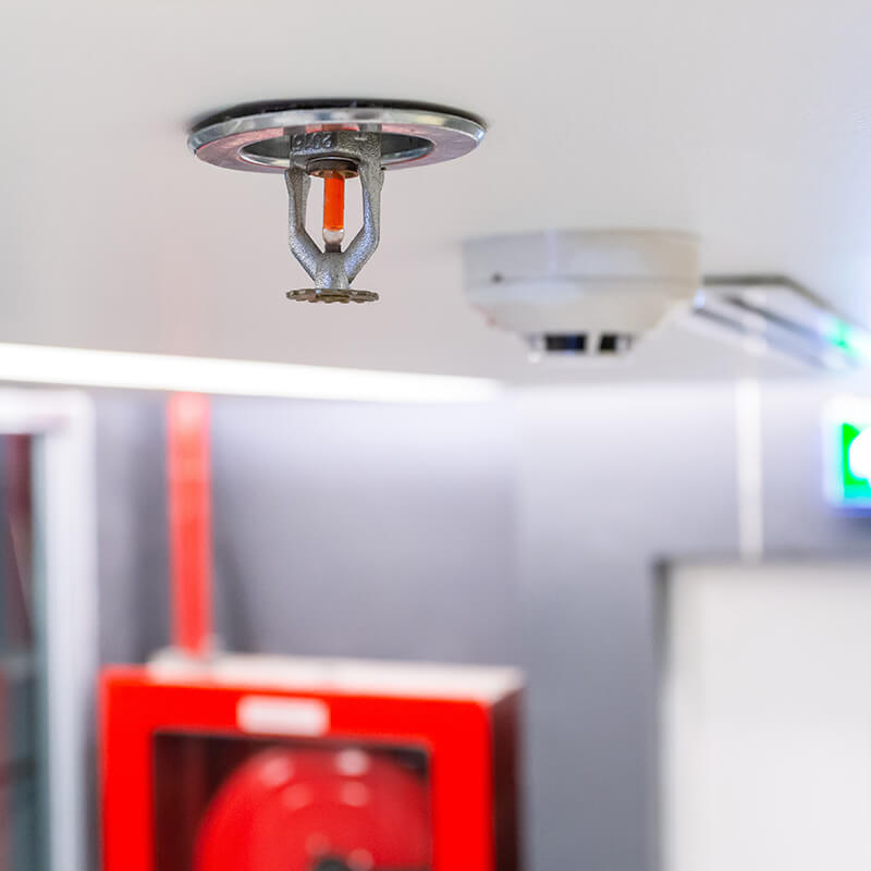 Fire sprinkler system on a ceiling