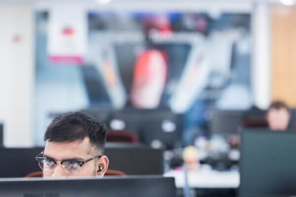 Mitie Intelligence colleagues working at desks