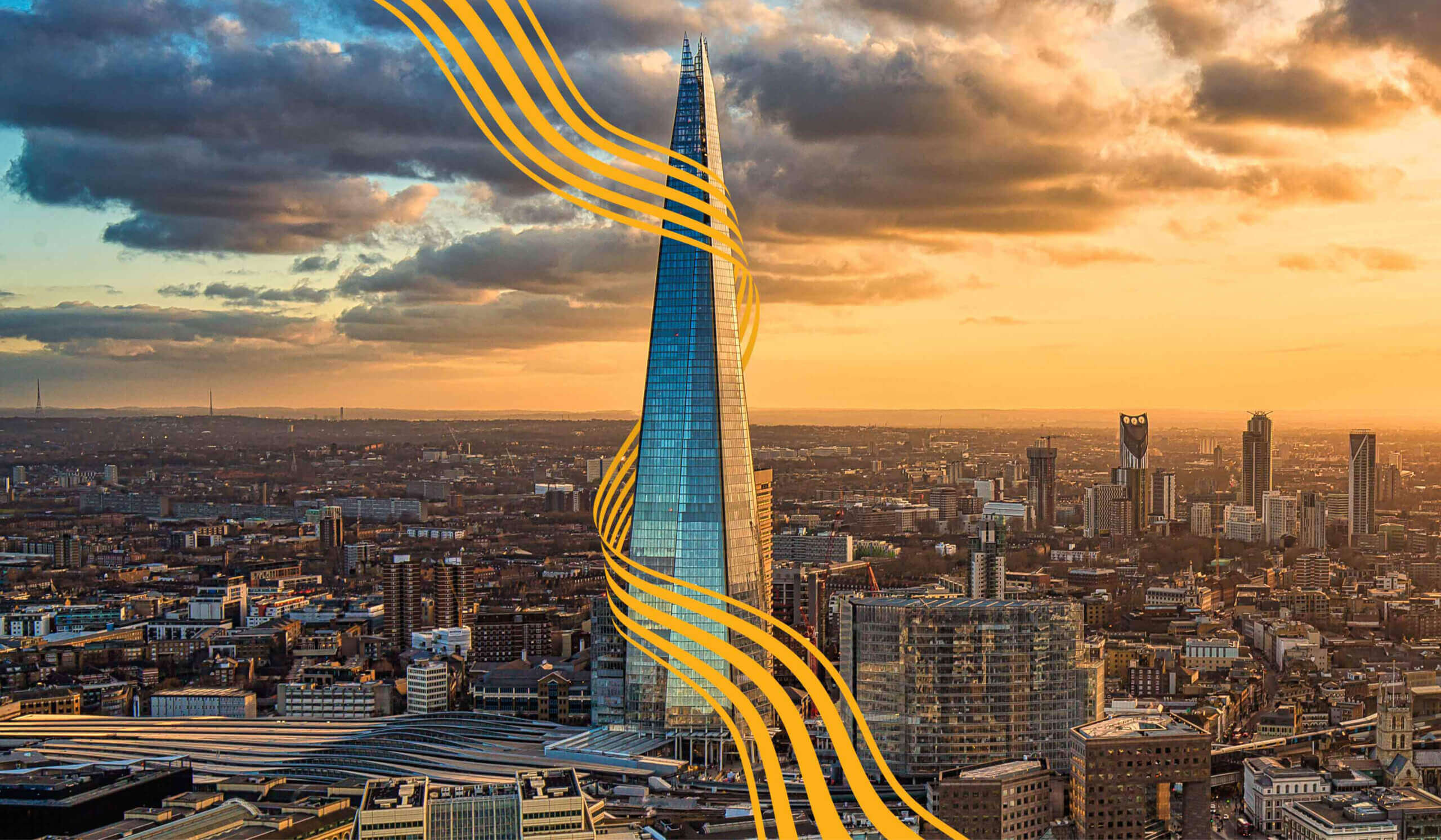 The Shard in London, wrapped in a yellow Mitie fabric
