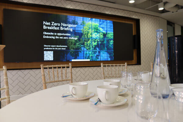 Welcome screen at Mitie's Net Zero Navigator 2025 breakfast briefing