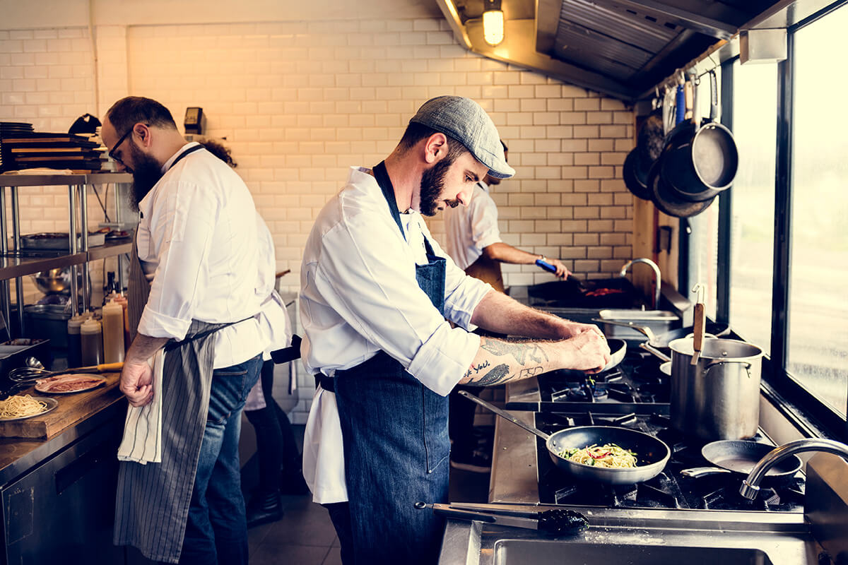 Men working in a professional kitchen