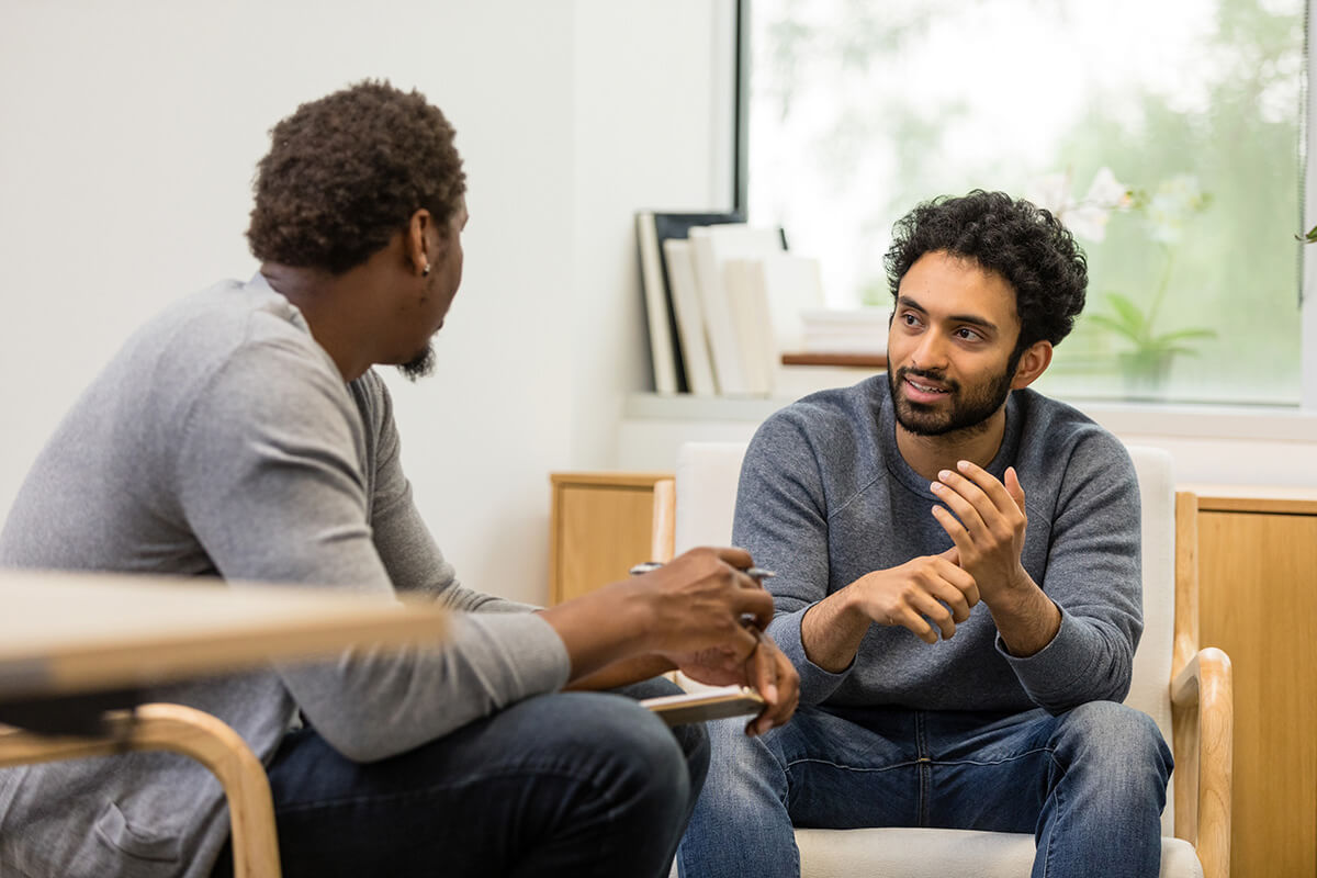 Two men talking