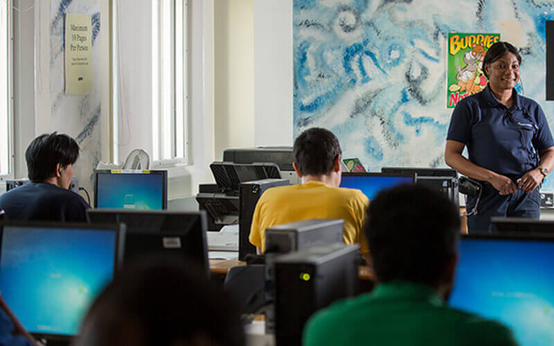 People learning at an immigration centre