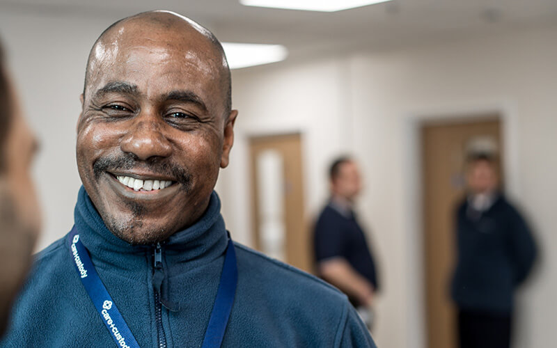 Close up of smiling Care & Custody colleague