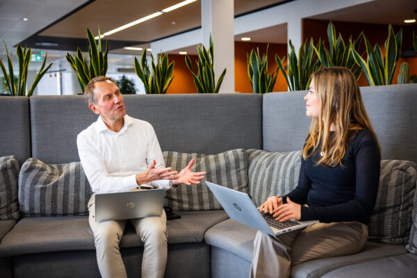 A meeting in an open plan office