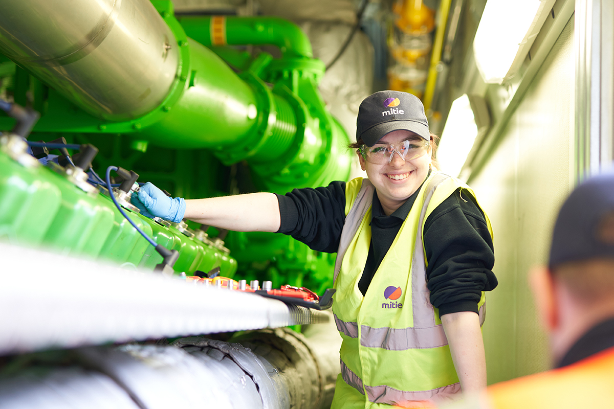 Smiling female engineering apprentice at Mitie