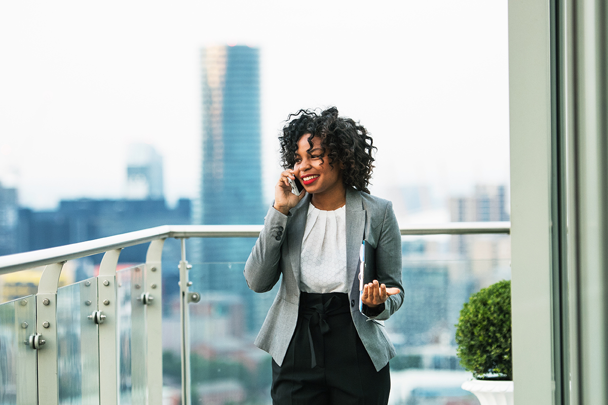 Black woman talking on a mobile phone
