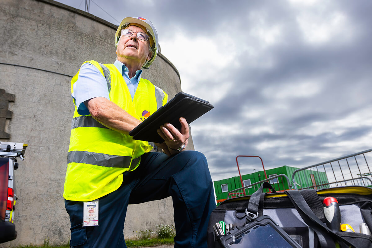 Mitie engineer checking compliance