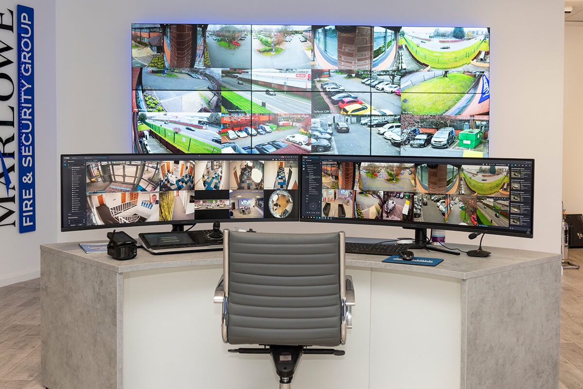 Security CCTV screens around a central chair