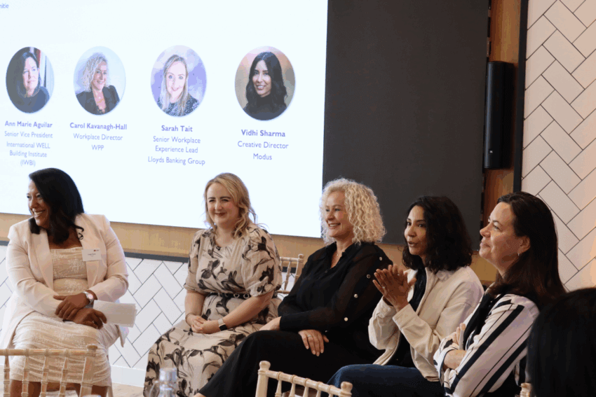 Panel speaking at event