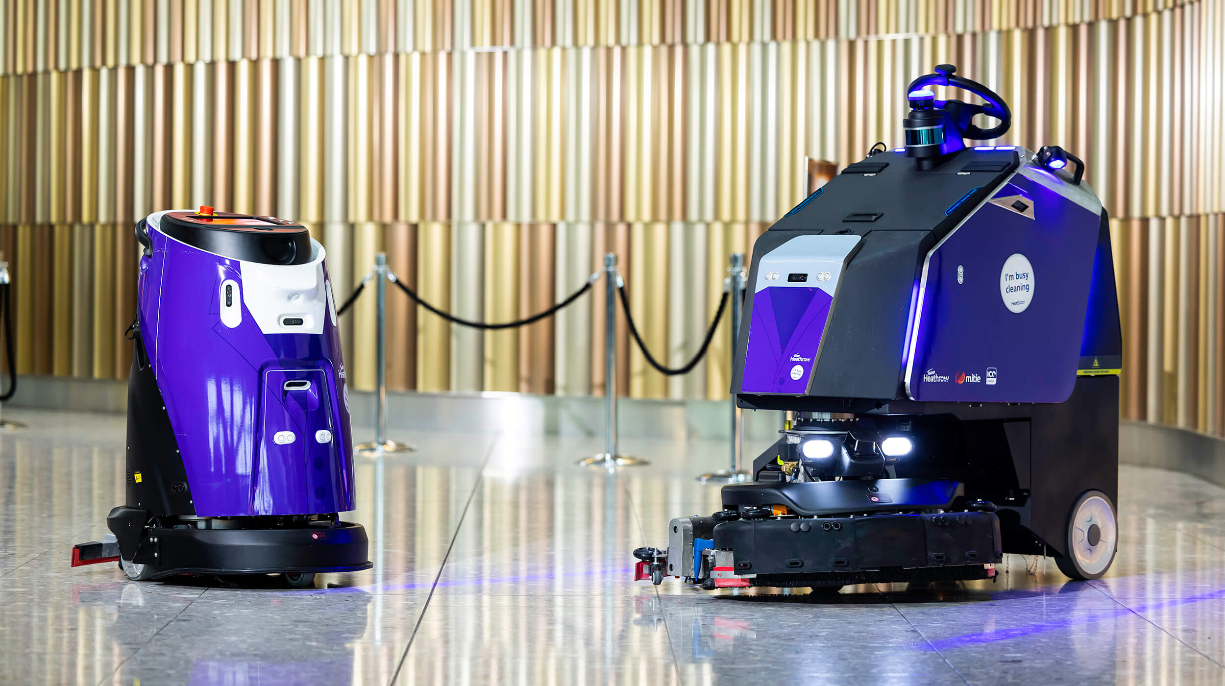 Two Mitie floor cleaning robots at London Heathrow Airport