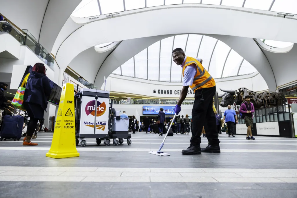 Mitie cleaning colleague at a rail station