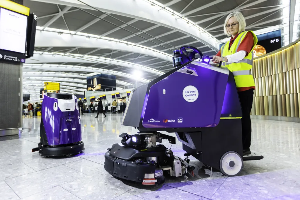 Two Mitie cleaning robots at London Heathrow Airport