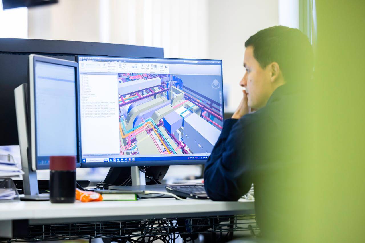 JCA colleague reviewing designs