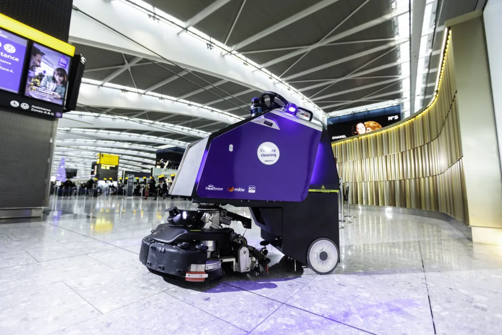 A Mitie cleaning robot in a terminal at London Heathrow Airport
