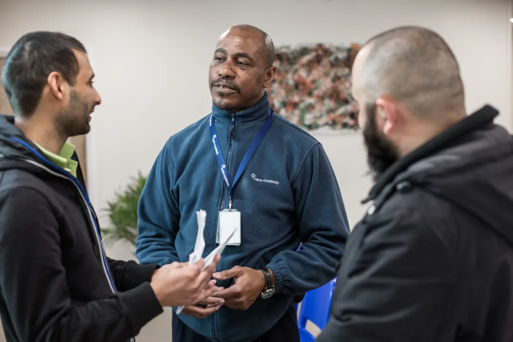 A group of Care & Custody colleagues talking