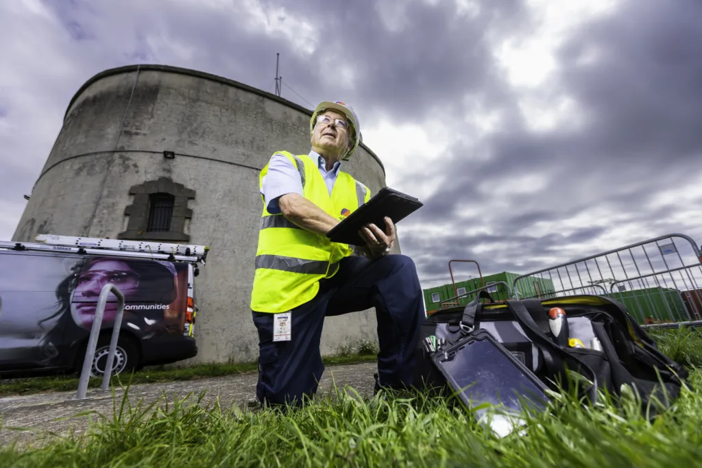 Mitie engineer checking compliance