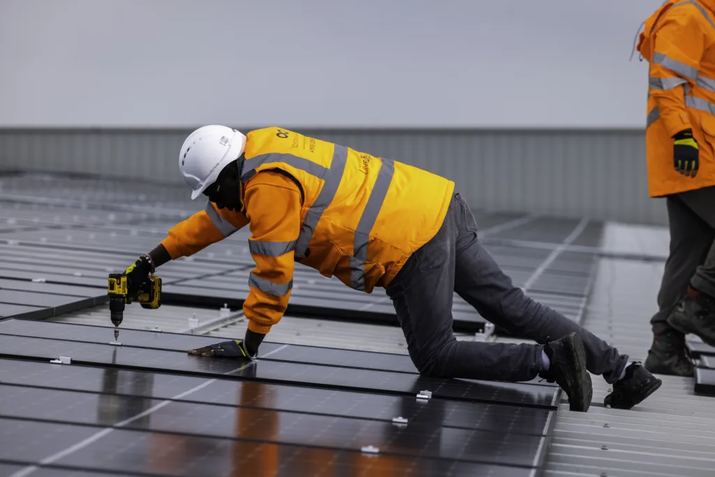 Custom Solar engineering installing a solar panel