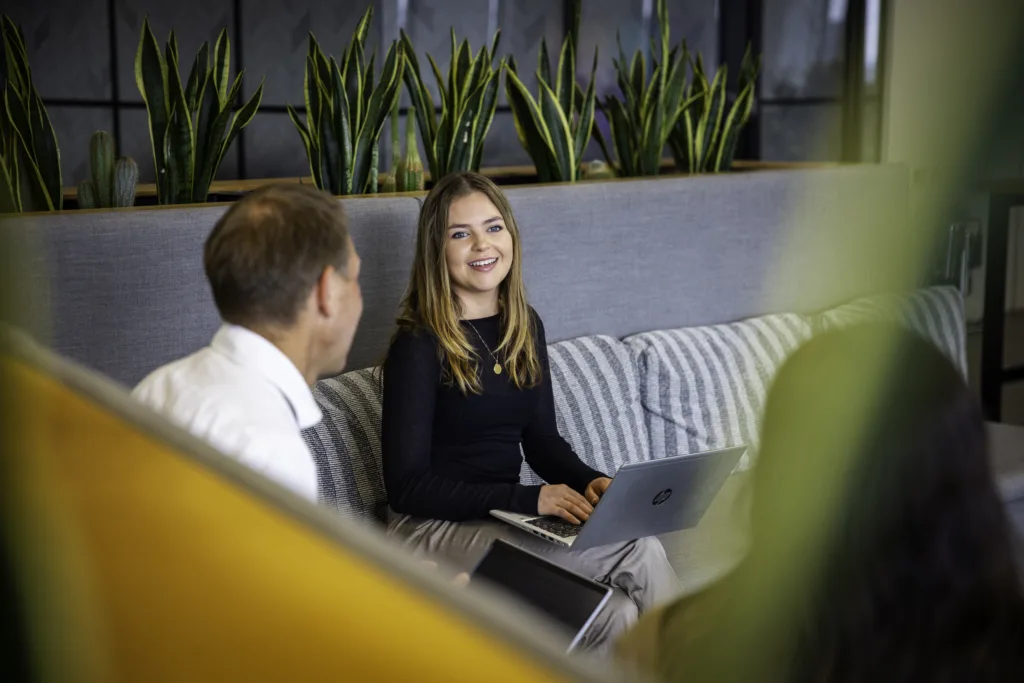 Mitie colleagues in an office meeting