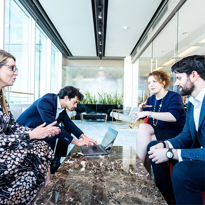 People having a meeting in an office
