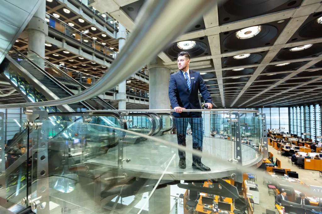 Mitie security guard on a glass balcony