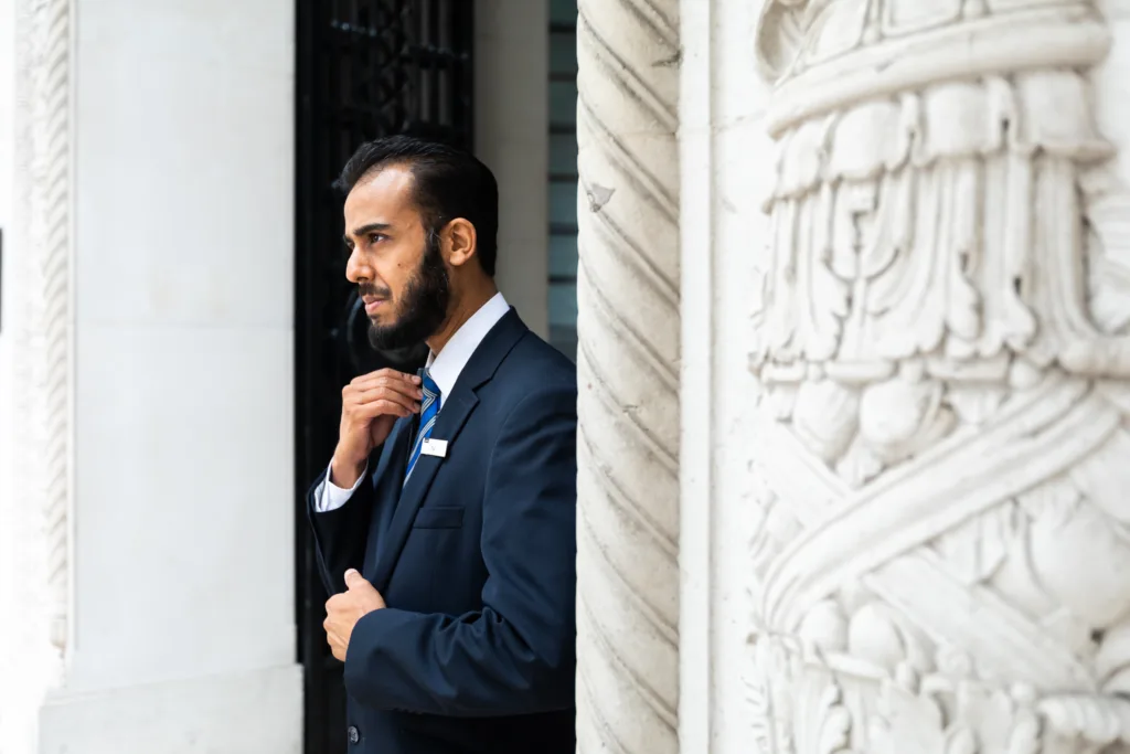 Mitie security guard at a door