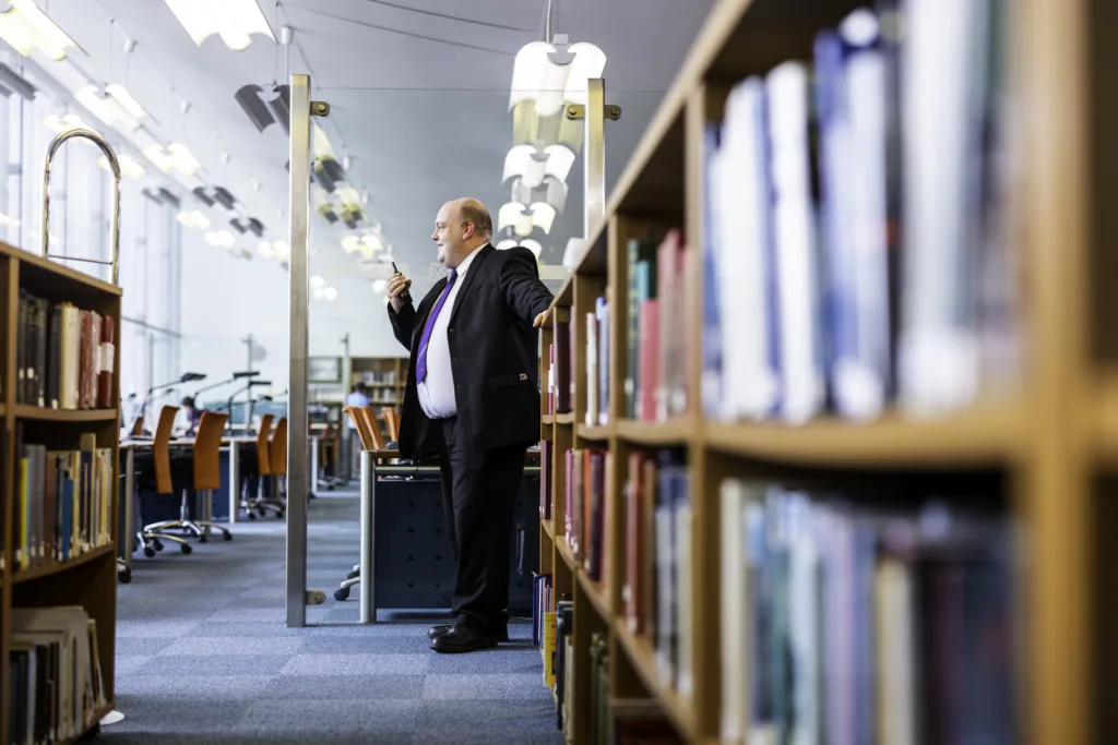 Mitie security guard in a library
