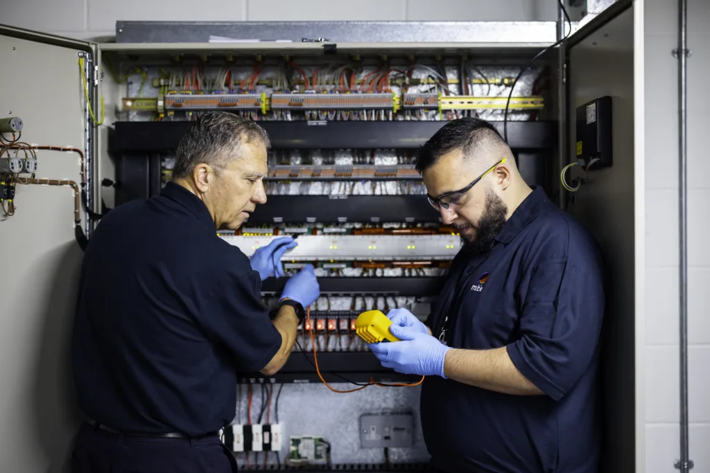 Mitie engineers testing electricals