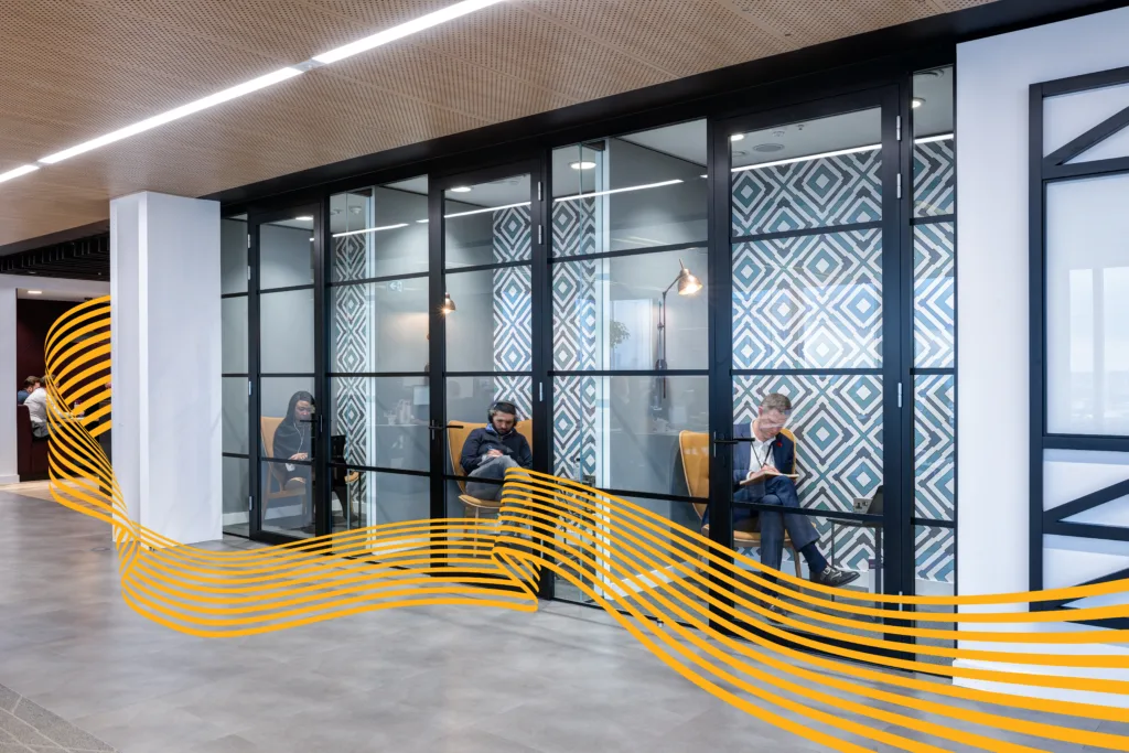 Meeting booths in The Shard offices, with golden wavy lines
