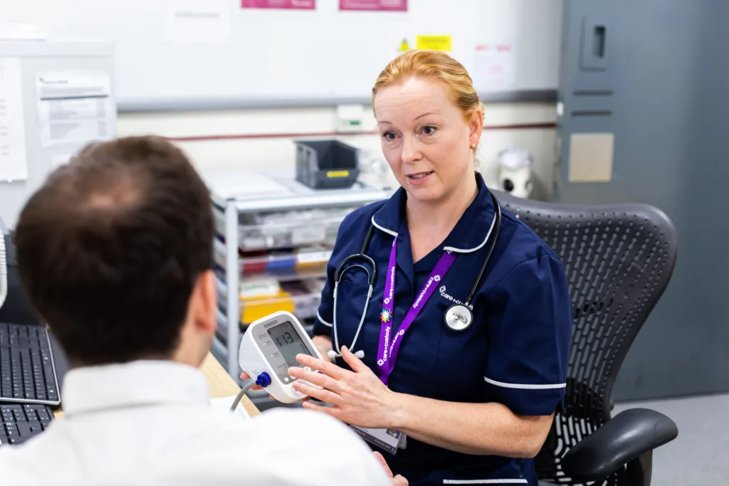 Care and Custody nurse taking blood pressure