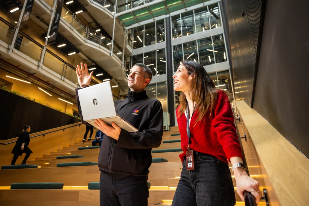 Mitie colleagues in an office atrium