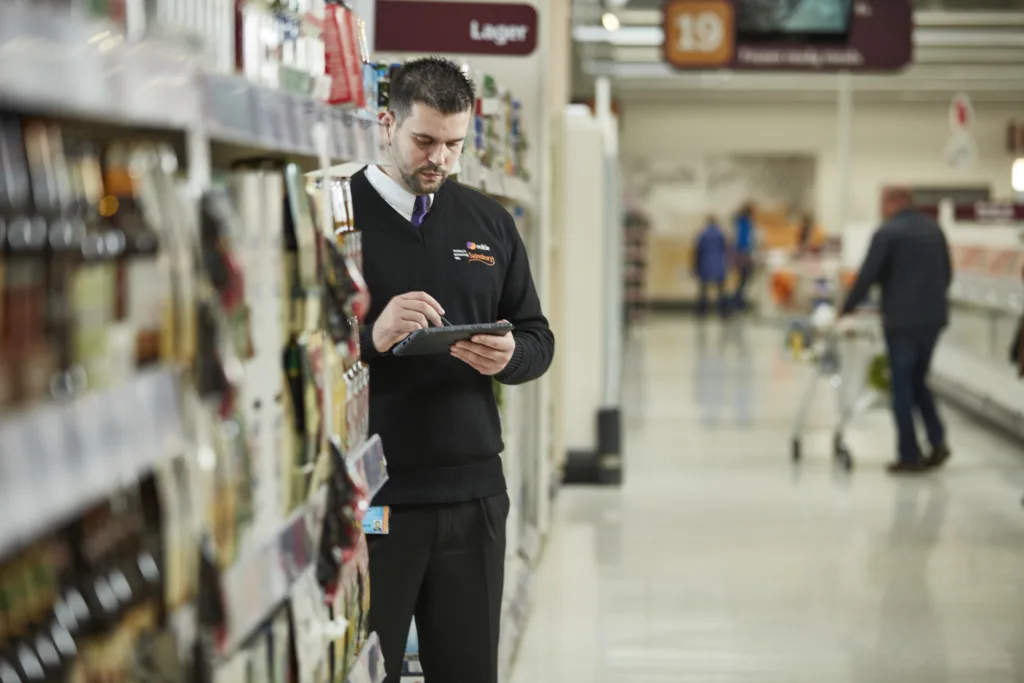 Sainsbury's guard using a device