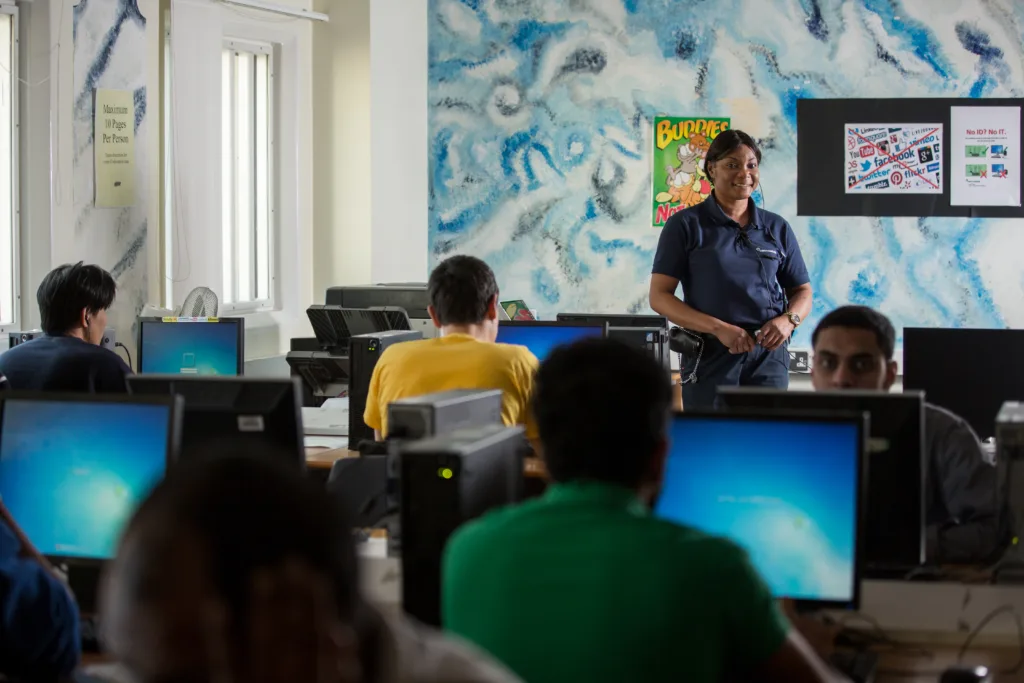 People learning at an immigration centre