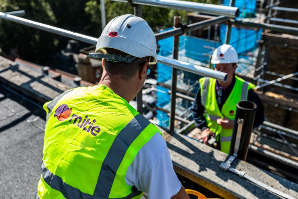 Mitie worker fixing a roof