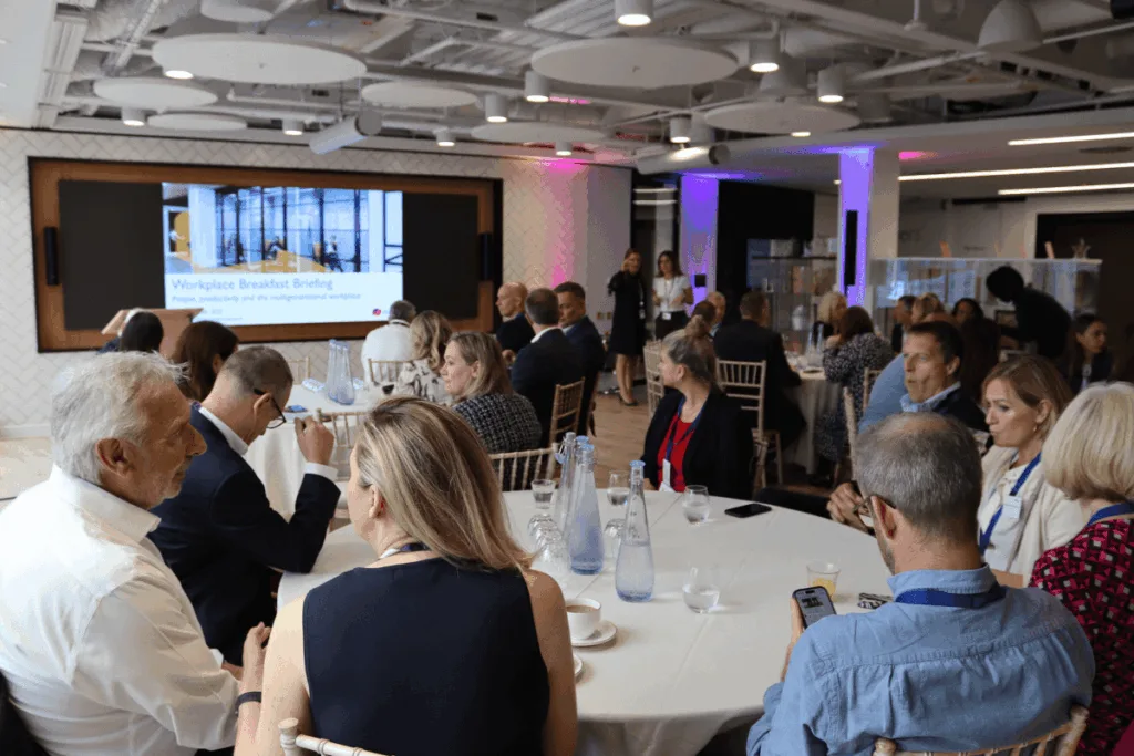 People sitting down at workplace event