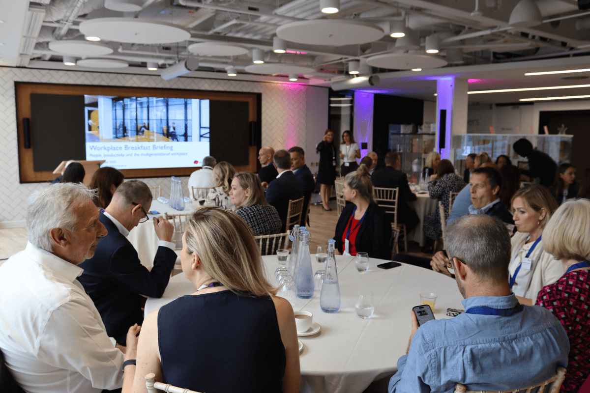 People sitting down at workplace event