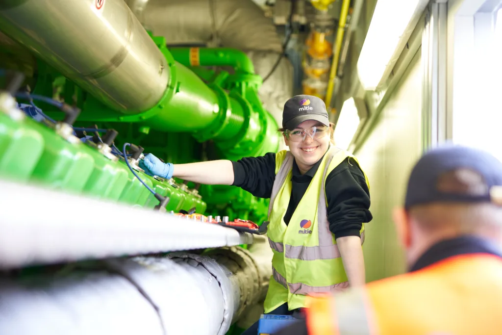 Smiling female engineering apprentice at Mitie