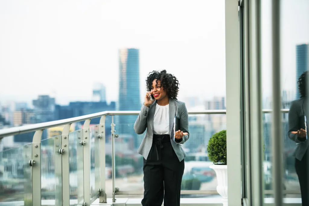 Black woman talking on a mobile phone
