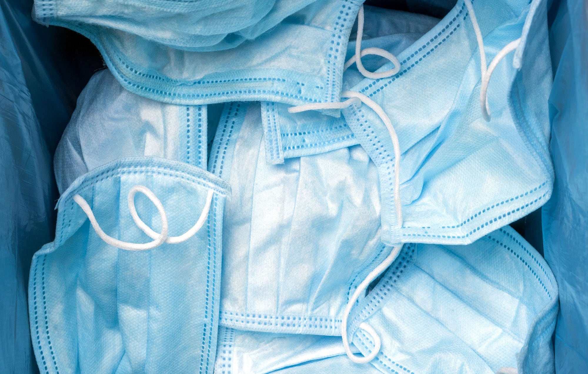 A pile of protective face masks.
