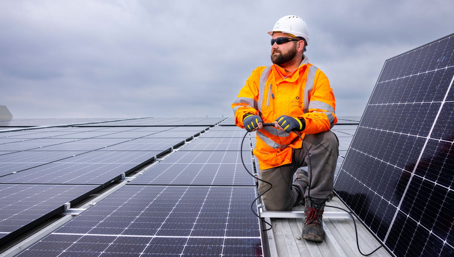 Man installing solar panels.