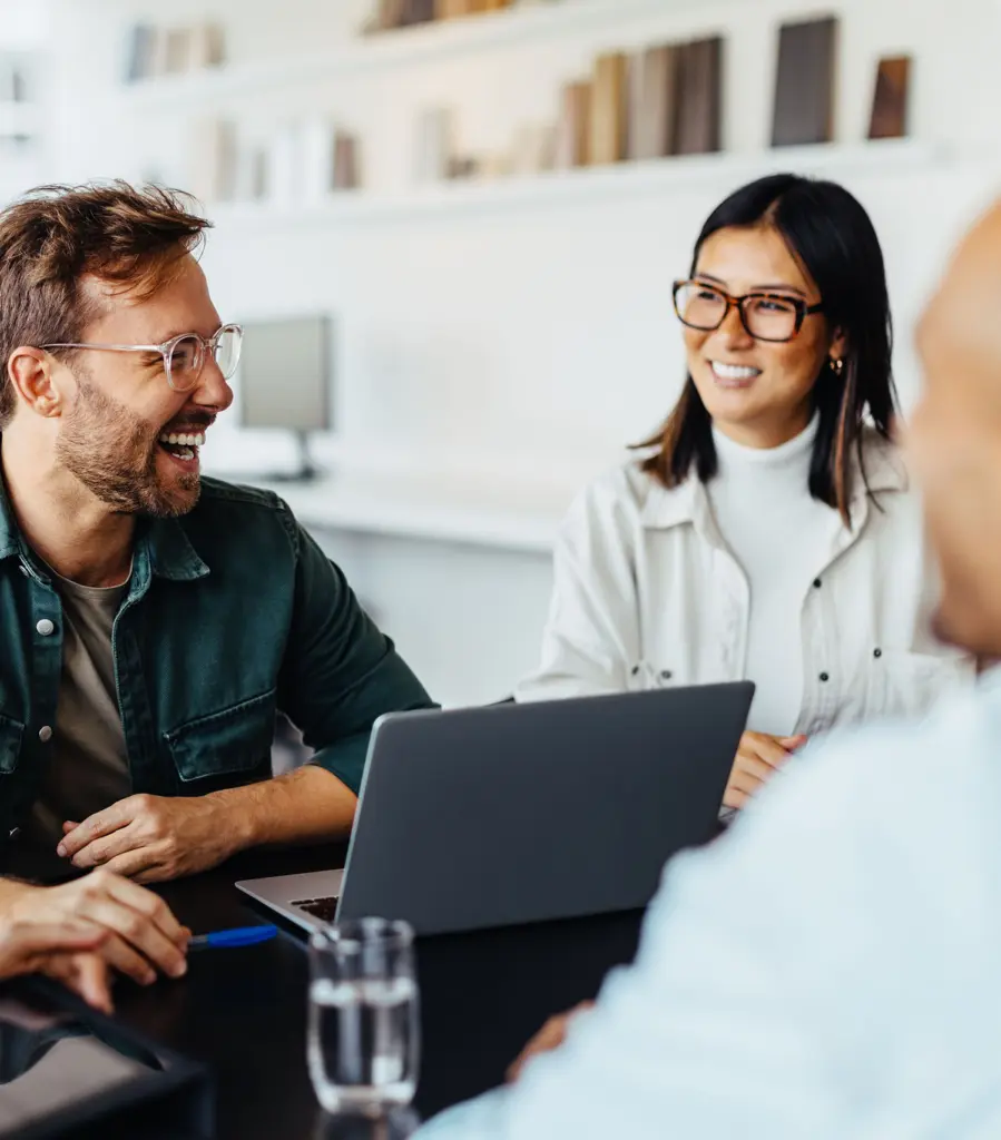 Smiling people in a business office meeting
