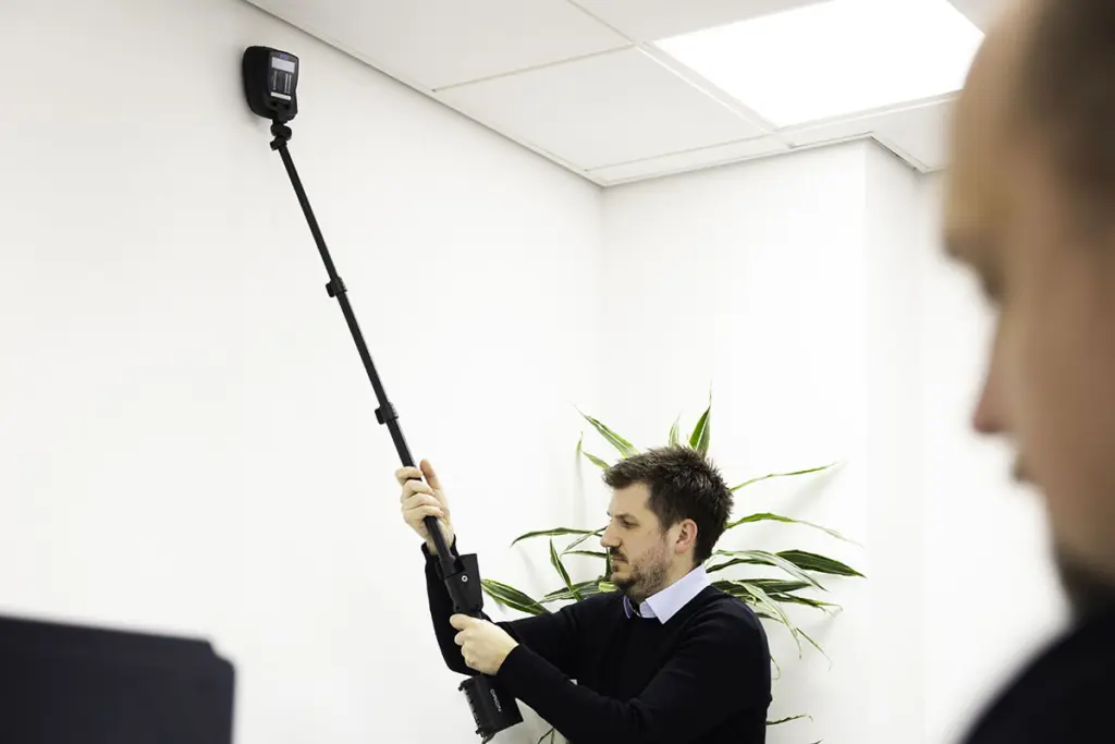 Security officer sweeping for listening devices