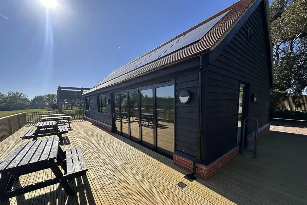 New building with solar panels at Essex Outdoors Mersea